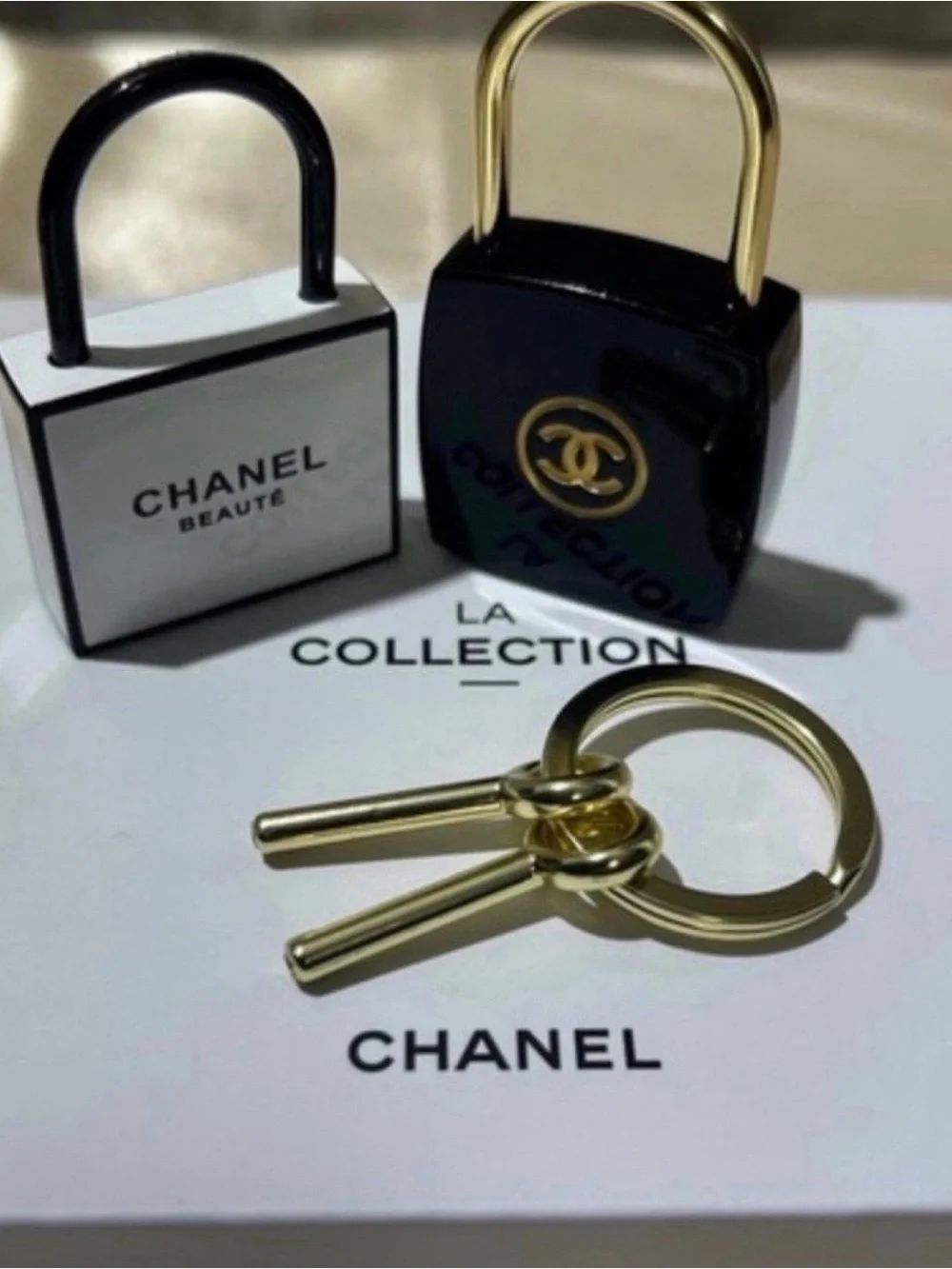 Chanel White and Black Mini Lock Keychain - Picture 2 of 4